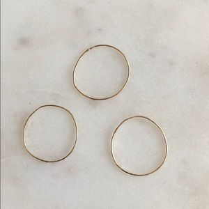 Set of 3 thin gold bands size 5. 12k gold